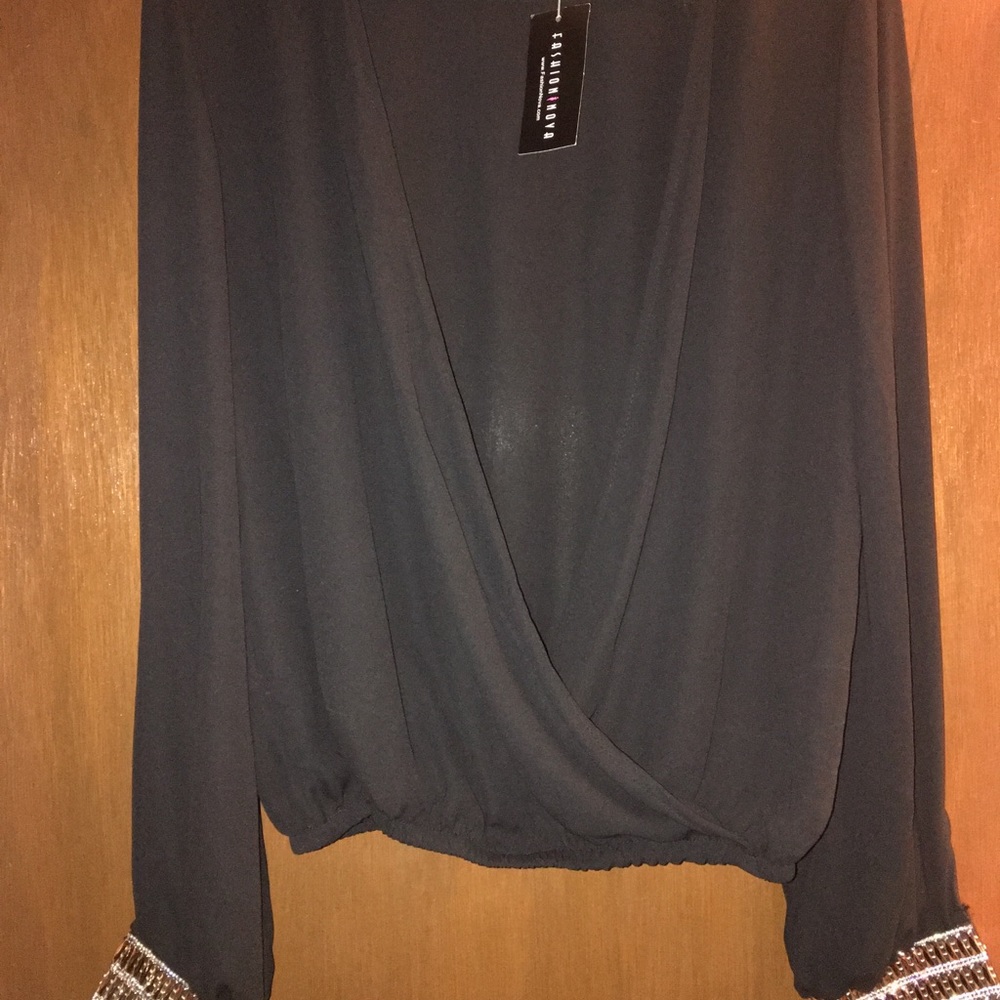 Never worn Fashion Nova top.